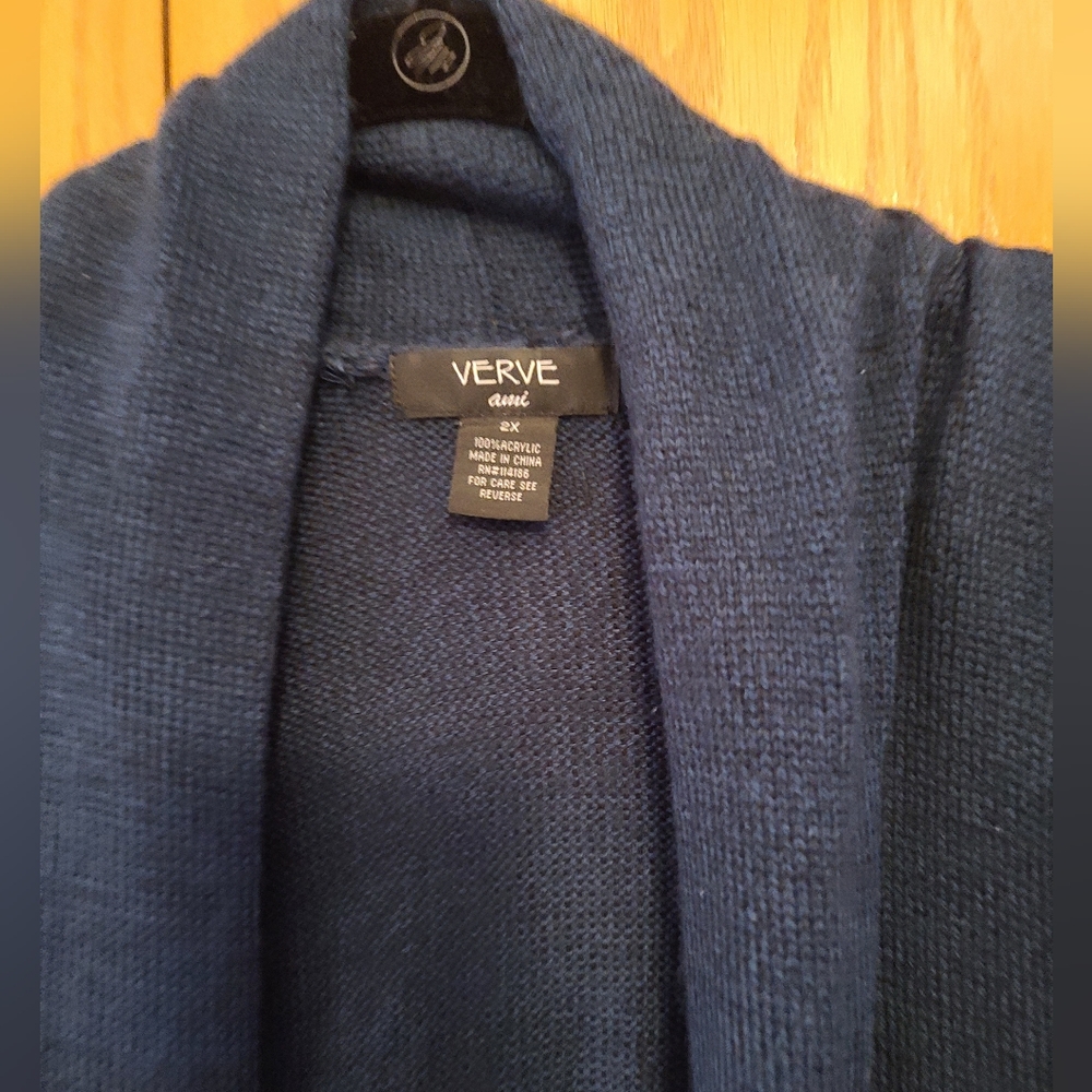 Blue sweater shorter cardigan.